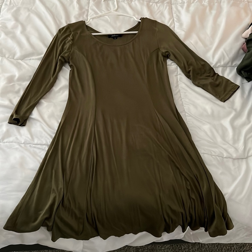 Medium size, dark green, mid length and mid sleeve bowl cut dress from Ambiance